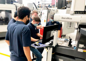 Machine tool technology CTE students work on programming